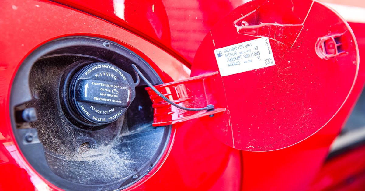 Red car fuel cap close-up — P0455 large EVAP leak gas cap diagnosis and fix