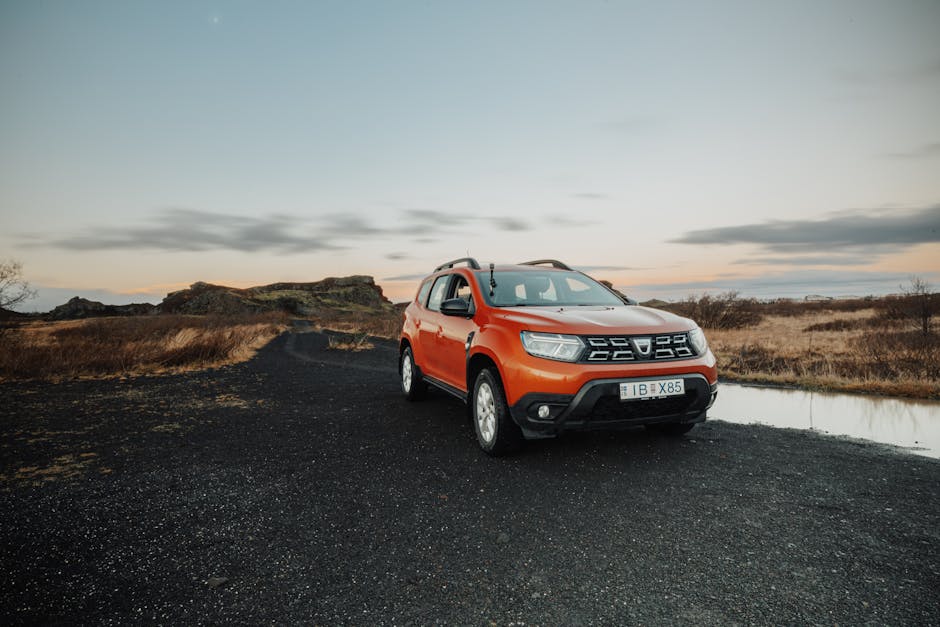 Dacia Duster SUV on a rural road — fuel cut-off inertia switch location and reset guide for Mk1 and Mk2