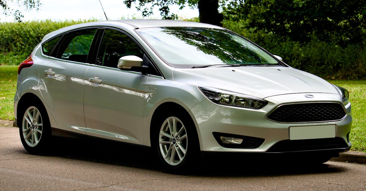 Silver Ford Focus hatchback on open road — inertia switch location and reset guide for Mk1/Mk2/Mk3 Focus