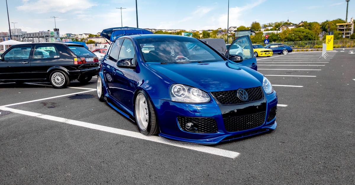 Blue VW Golf hatchback in urban setting — inertia switch and fuel cut-off location guide for Mk1-Mk7