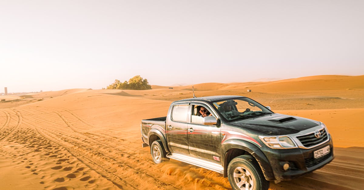 Pickup truck off-road in desert dunes — Toyota Hilux fuel cut-off and ECU crash cut diagnosis